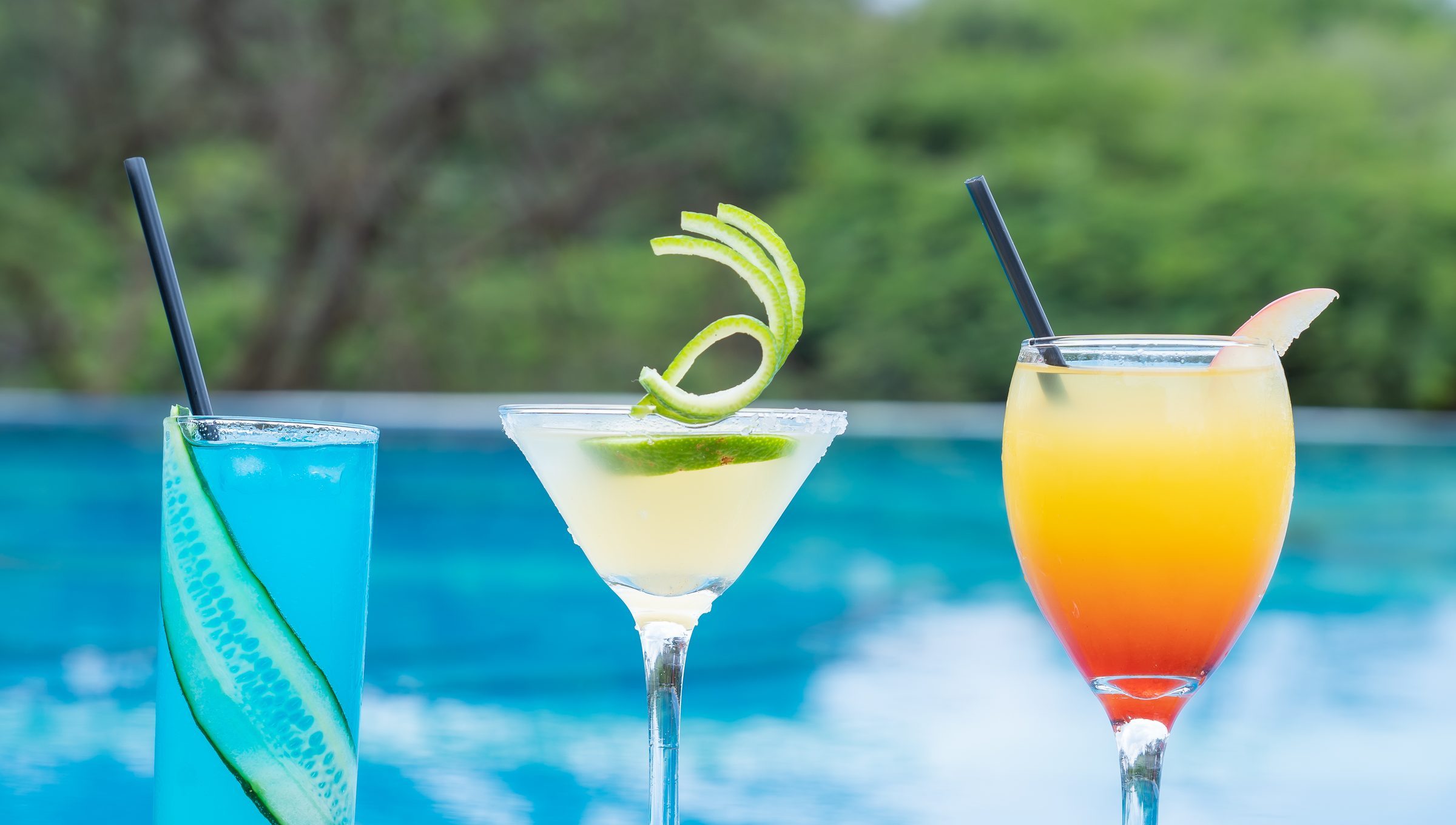 Three drinks beside the pool